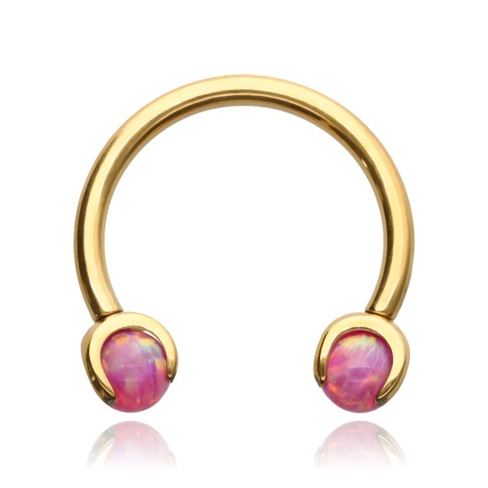 Titanium horseshoe earring gold with pink opal - TKP-004