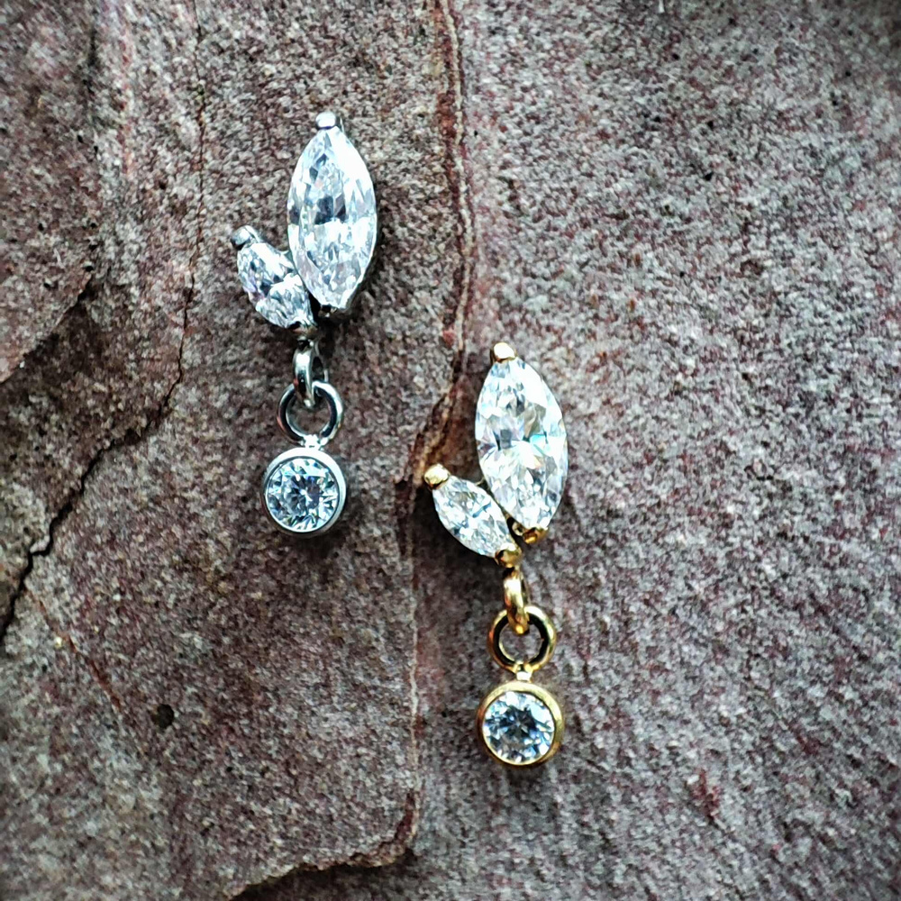 Titanium attachment with white zircons - gold - TNA-028