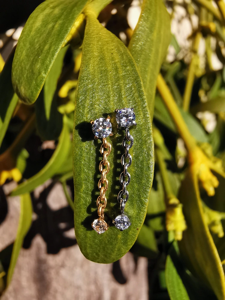 Titanium attachment with white zircons - gold - TNA-094