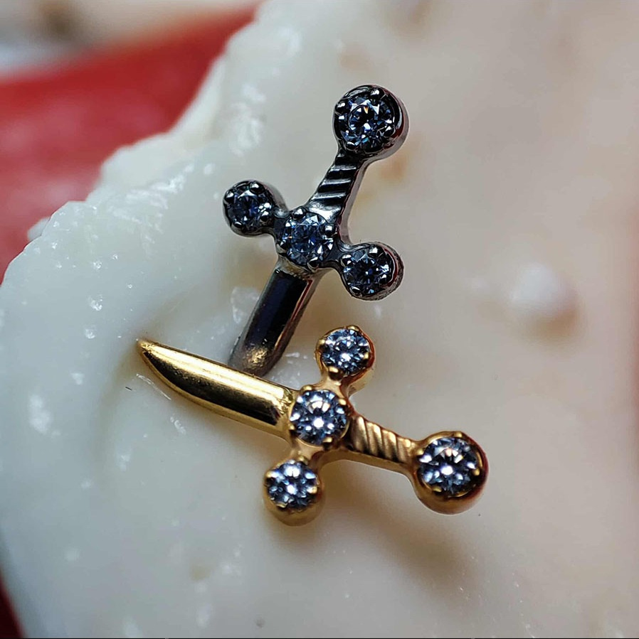 Titanium attachment dagger with white zircons - gold - TNA-026