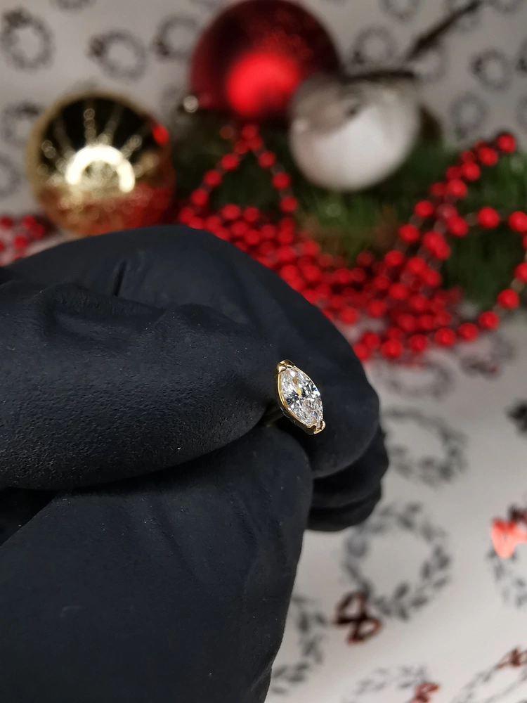 Titanium gold labret teardrop with white zirconia
