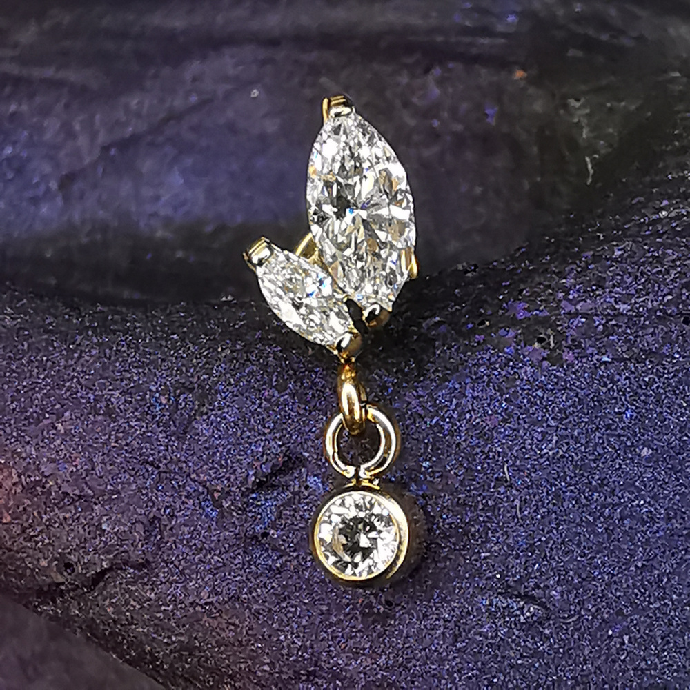 Titanium attachment with white zircons - gold - TNA-028