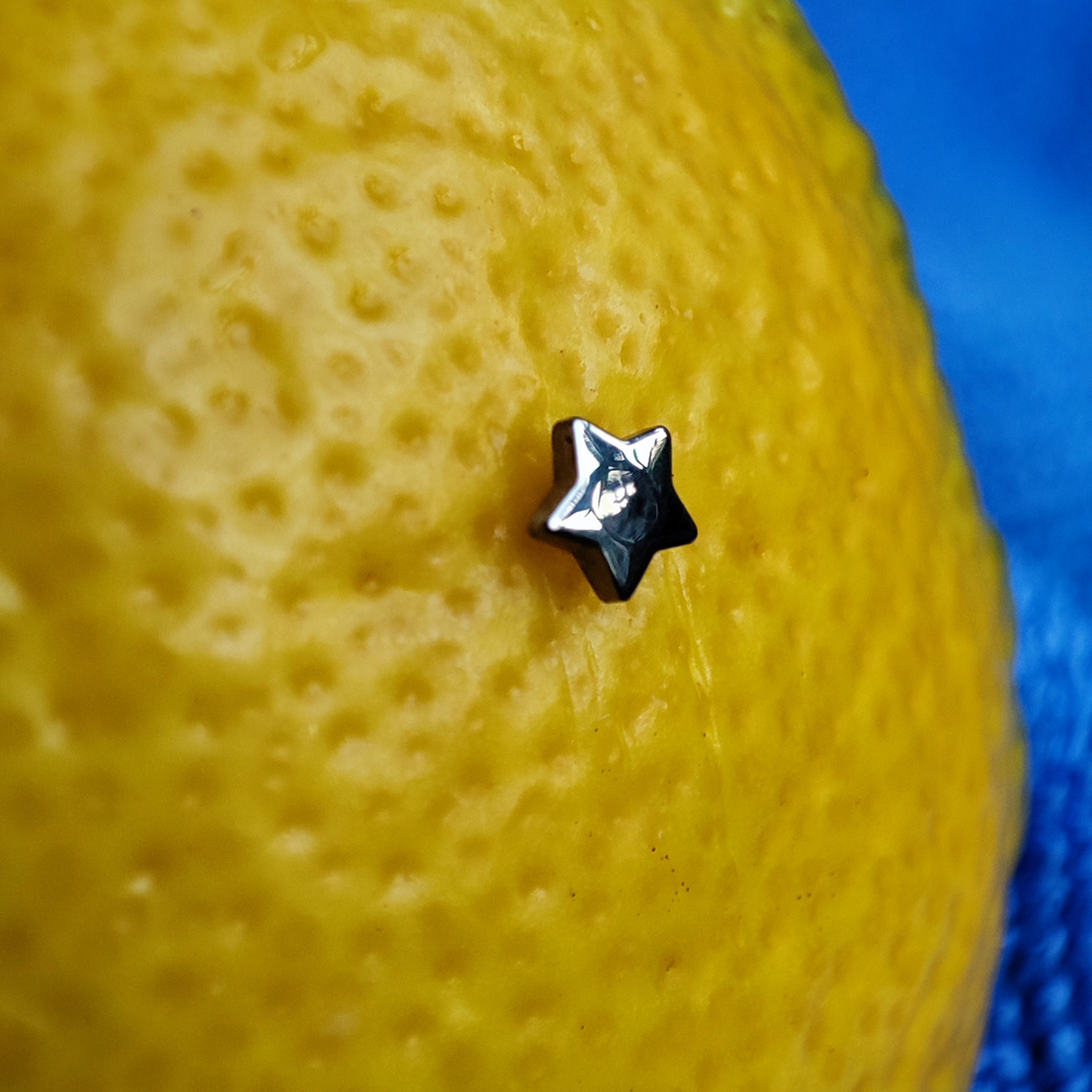 Tytanowa nakrętka gwiazdka - srebrna - TNA-013