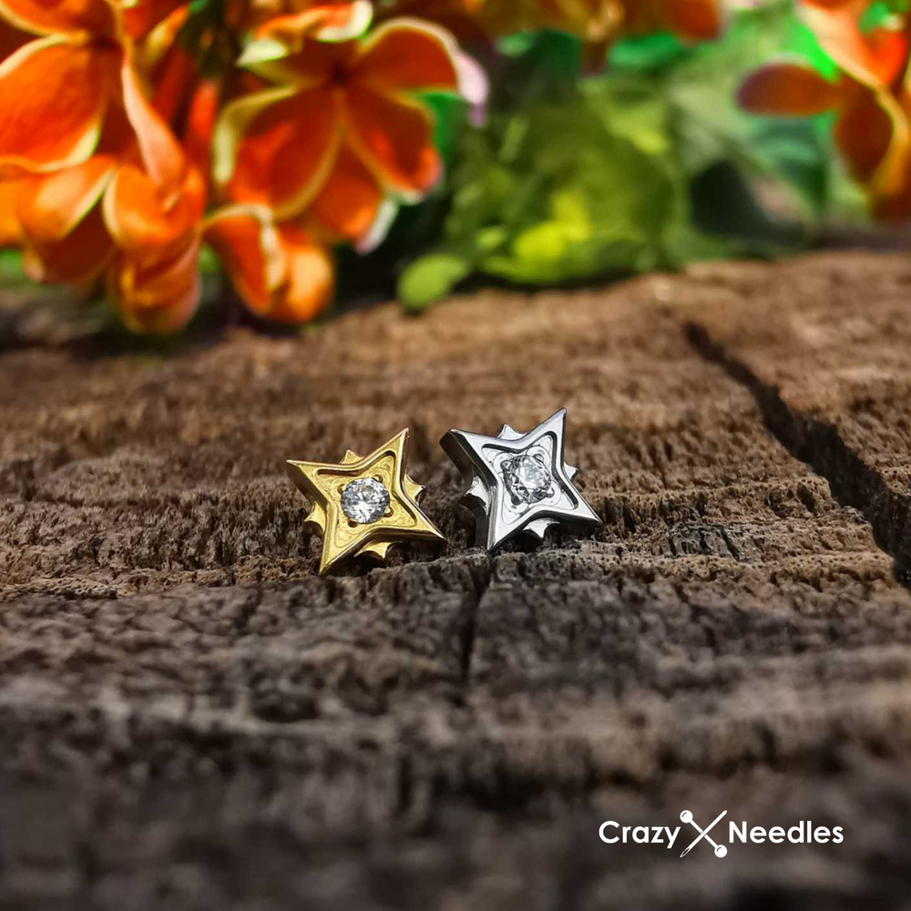 Titanium labret star with white zirconia - gold