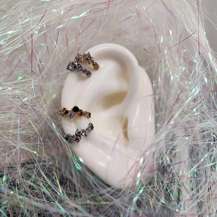 Piercing ring clicker with colored zircons - CoCr NF - gold - K-066