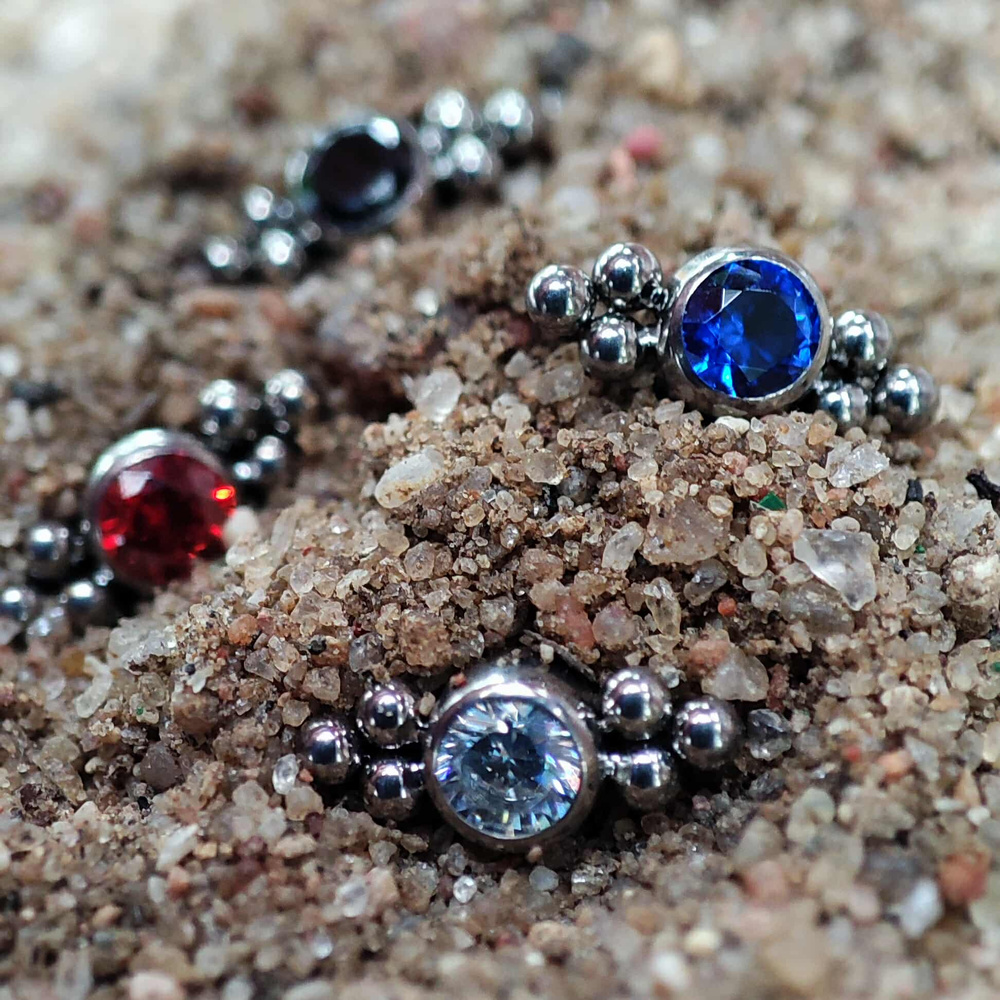 Titanium attachment with red zirconia and balls - TNA-022